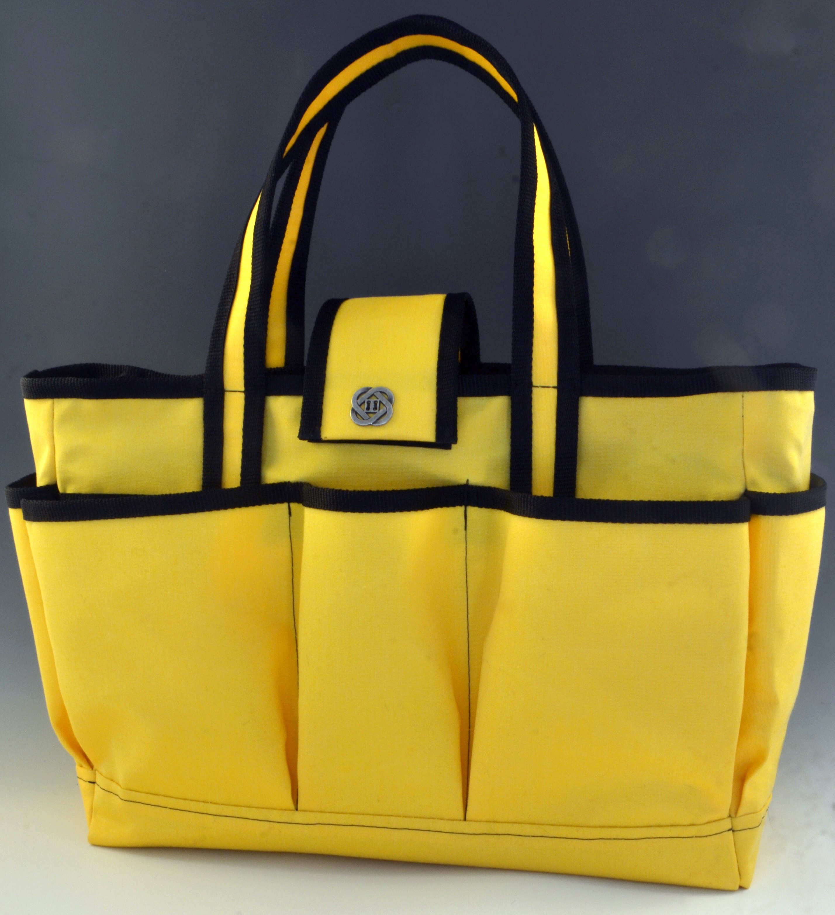 CLN - A handbag that fits all your needs! Crafted in nylon
